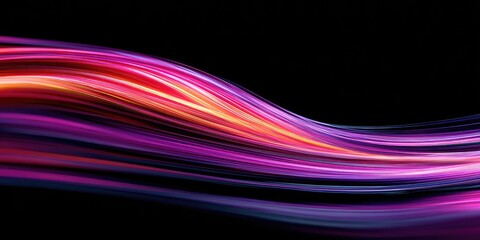 Abstract swirling ribbons of vibrant color on black background