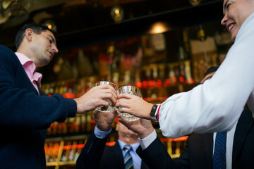 Business group networking at luxury rooftop bar and restaurant with drinks in modern city