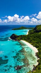 Fototapeta premium Aerial view of a tropical island's pristine beach and vibrant coral reef