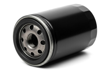 Close up of a black oil filter with metal end cap and threaded center on a white background