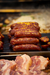 a classic combination from a Taiwanese night market or food stall: grilled sausage and sticky rice sausage