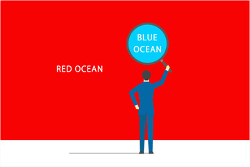 虫眼鏡を使ってレッドオーシャンからブルーオーシャンを見つけるビジネスマン