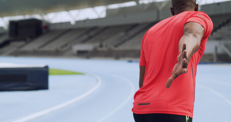Back, hand and running at race track for relay, competition and fitness challenge outdoor. Sprint, sports and man at stadium for training, workout or cardio exercise with practice for athletics