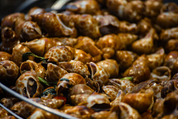  a classic Taiwanese night market delicacy—stir-fried snails