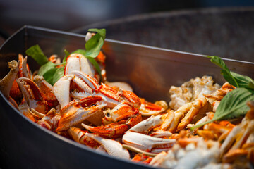 a vibrant Taiwanese stir-fry restaurant or night market dish—stir-fried crab claws