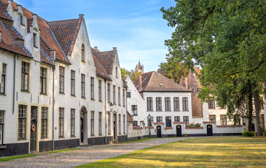 Courtyard of the Beguinage in the old city Bruges (Brugge), East Flanders, Belgium
