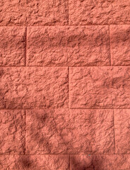Rough red brick wall as texture or background