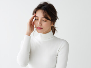 頭痛に悩む女性