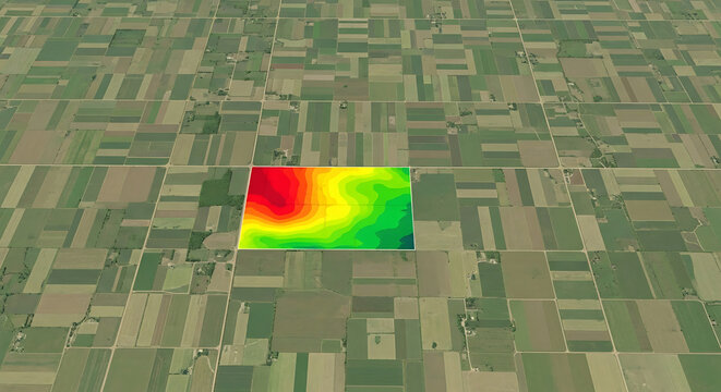 Precision agriculture and smart farming concept showing an aerial view of fields with a colorful data heatmap for crop analysis and yield prediction.