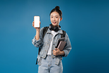 Student holding a phone with a blank screen ready for learning and engagement with education apps