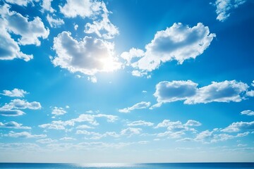 Obraz premium Clear blue sky with puffy white clouds and ocean horizon