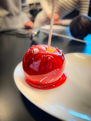 Bright red candy apple