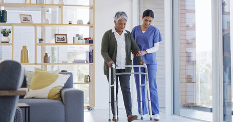 Walker, helping and nurse with senior woman for support, rehabilitation or physical therapy in...