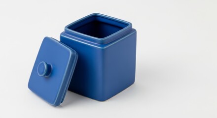 Square Blue Ceramic Jar with Lid - A stylish cobalt blue ceramic jar with a square shape and matching lid, perfect for storage or display. Clean and modern design