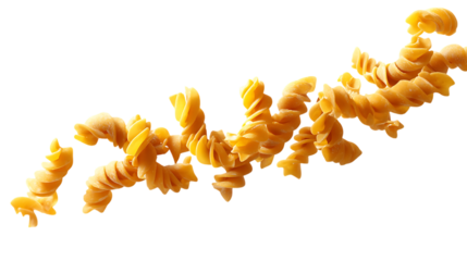 Spiral pasta pieces in motion against a black background.