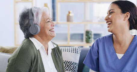 Headphones, healthcare and nurse with funny old woman in assisted living apartment for bonding....