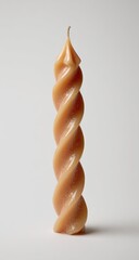 Beige spiral candle on white background