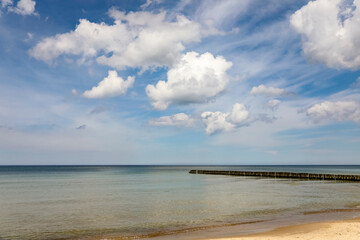 Clouds in the sky over the Baltic Sea on a sunny day, as seen in Ustronie Morskie, Poland