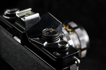 SLR camera with exposure control knob, it is an old analog unit