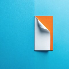 Blank orange notepad with curled white page against teal background