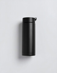A sleek, black stainless steel insulated water bottle with a sipper lid, presented in a minimalist studio product photograph.