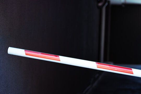 automatic barrier stick red white stripped color of car parking underground entrance tunnel - Powered by Adobe