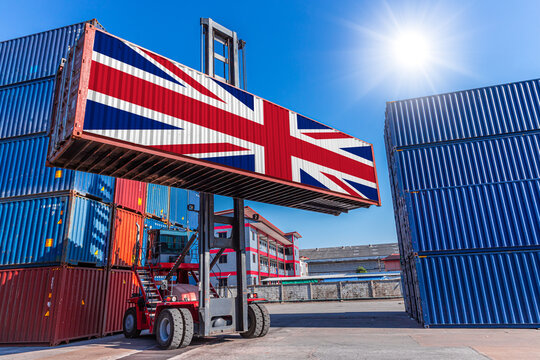 Fototapeta Products shipping cargo goods with United Kingdom flag for import export business from UK country