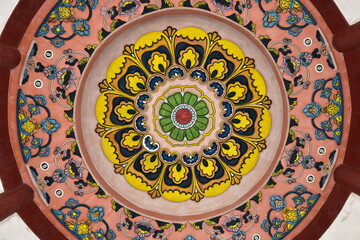 Intricate Mandala Design with Vibrant Colors and Symmetrical Patterns