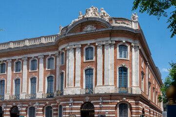 Fototapeta premium Views of Toulouse, city in southern France, Haute-Garonne department, Occitania region, centre of European aerospace industry with pink red bricks houses, travel destination