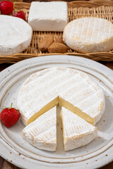 French soft cheeses collection, creamy cow's milk cheese brie with white mold, France