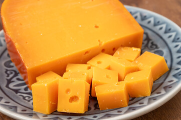 Cheese collection, Dutch ripe hard chees made from cow milk in the Netherlands in piece and in blocks close up