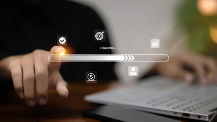Businessman touching virtual progress loading bar on digital screen interface