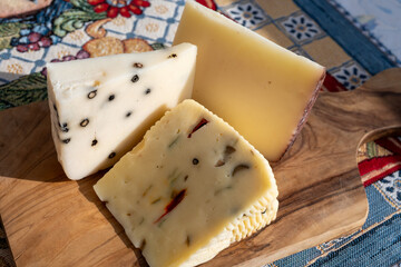 Italian provolone cheese made with fresh rocket salad, black pepper, olives, wine, Sicilian cheese, Palermo food