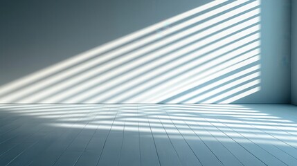 Obraz premium Sunlight streams through window blinds, casting shadows on a pale room