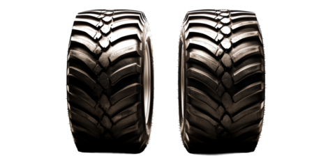 Two Heavy Duty Tractor Tires on Transparent Background