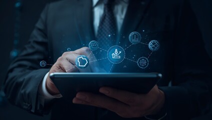 A businessperson interacts with a digital tablet, displaying a network of interconnected applications, showcasing modern technology.