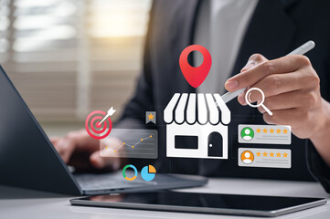 local business marketing and SEO strategy concept. businessman using tablet and laptop to analyze customer reviews, location data, performance charts and feedback for brand growth