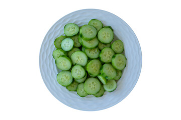Freshly Sliced Cucumber Pieces Served in a White Bowl for Healthy Eating