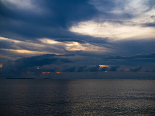 Cloud storm sky dark rain lightning thunder on sea ocean stormy typhoon nature light scene rainy...