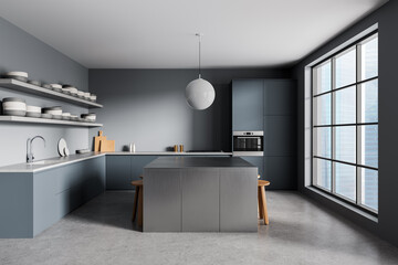 Modern minimalist kitchen interior with sleek cabinetry, large window, and stainless steel island...