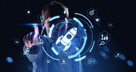 Young boy interacting with futuristic digital interface showing © ImageFlow