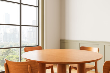 Modern wooden dining table and chairs in bright city-view interior space with soft natural lighting...