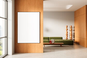 Modern interior with empty poster mockup on wooden wall beside stylish living room with green sofa...