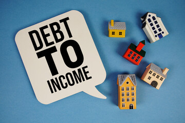 DTI Debt-to-Income Ratio text with house models on blue background