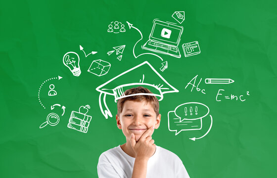 Smiling boy thinking about education with doodle-style symbols o