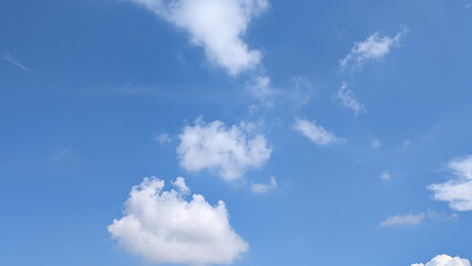 Serene Blue Sky with Wispy White Clouds. Peaceful, Bright, Summer Day Background Image