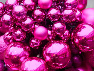 Christmas Texture or background of bright pink balls. Greeting or postcard