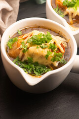 French Onion Soup with Baguette, Cheese and Parsley