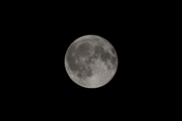 full moon over black