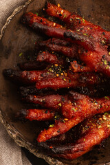 Caramelized korean or Chinese chicken foots ( paws ) with furikake